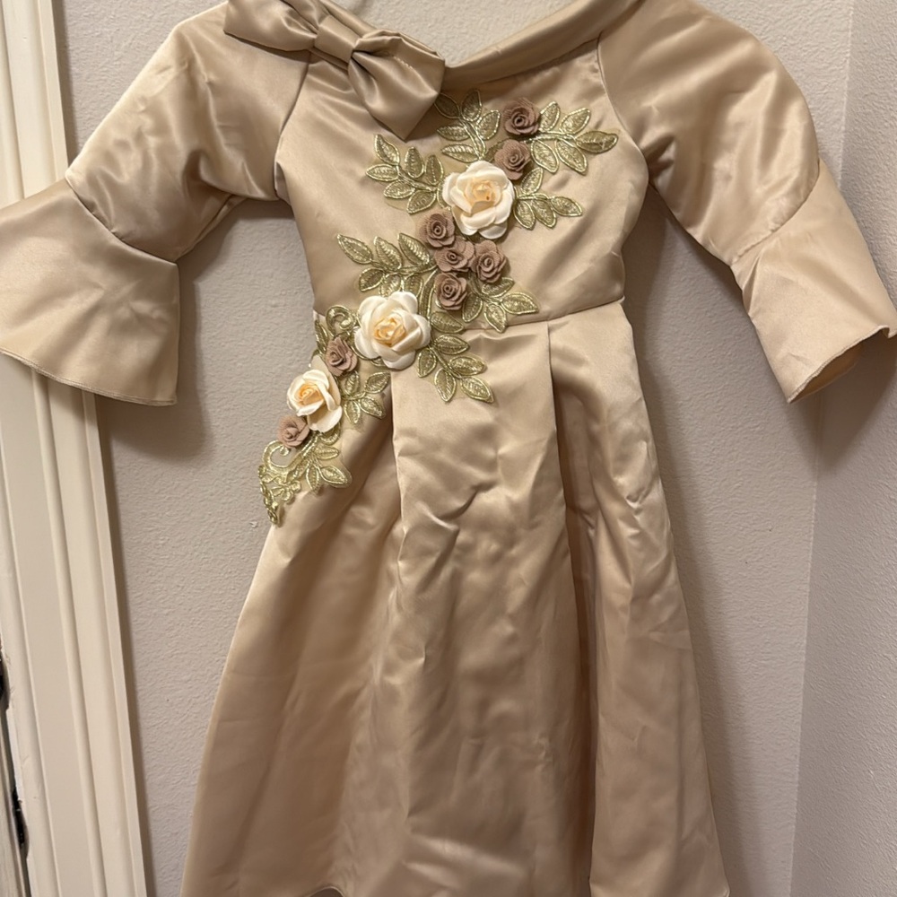 Elegant Cream Dress with Floral Embellishments